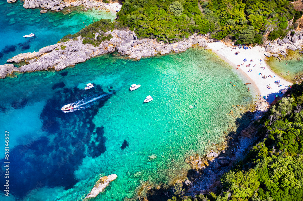 Corfu island, Greece . Aerial view of beautiful double beach with turquoise clear waters Limni beach Glyko near Paleokastritsa.