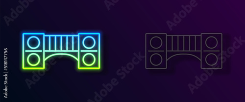 Glowing neon line Playground kids bridge icon isolated on black background. Vector