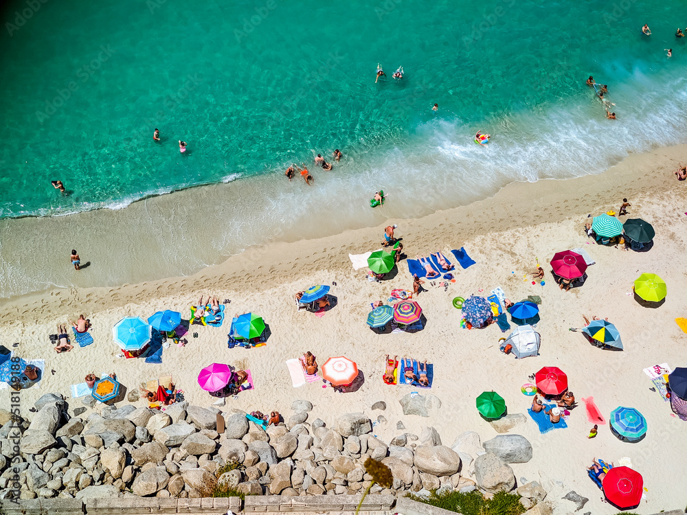 Italian beaches with tourists top view