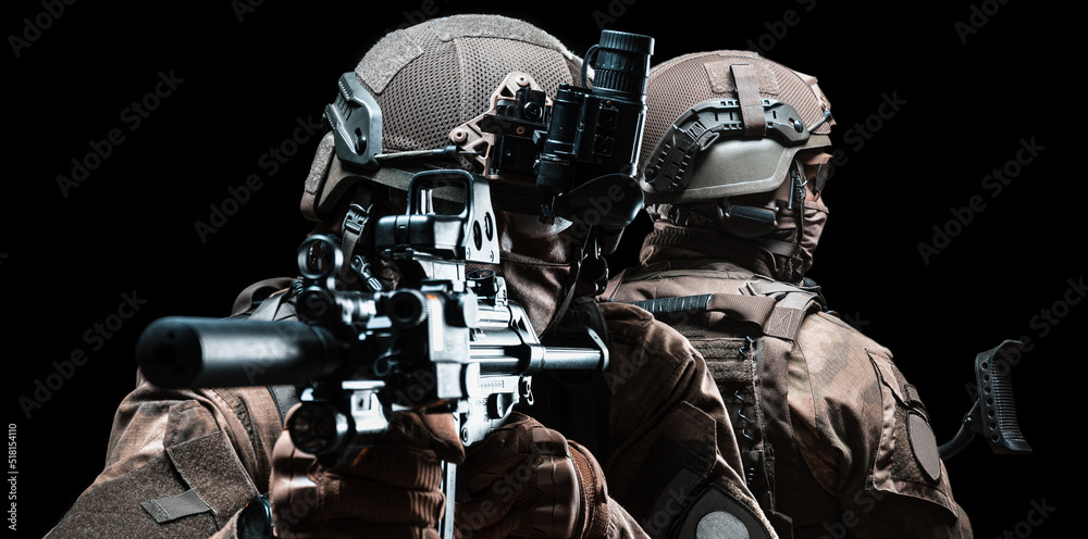 Armed special forces group on a dark background. Law and order protection concept. SWAT group. Antiterrorism. Armed special forces group on a dark background. Law and order protection concept. SWAT group. Antiterrorism.