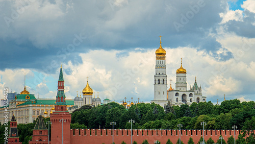 Kremlin embankment on River Moscow. On background Grand Kremlin palace, Church Of The Kremlin.