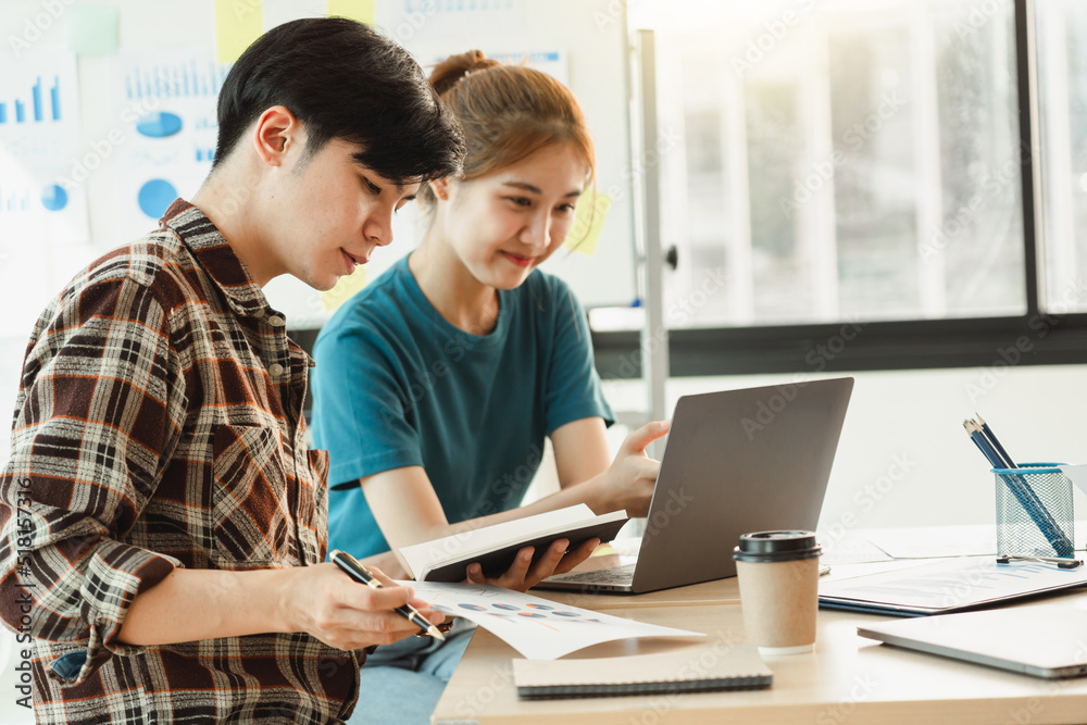 Team of Asian Start up business people working together with friends with happy action and celebrate in the modern office. Team of Asian Start up business people working together with friends with happy action and celebrate in the modern office.