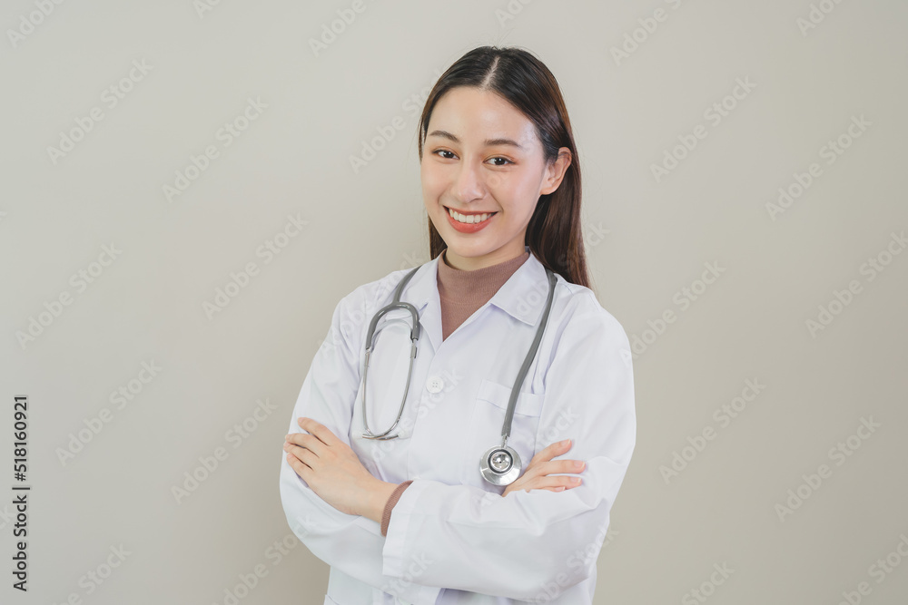 portrait female modern doctor standing crossed arm isolated on background portrait female modern doctor standing crossed arm isolated on background