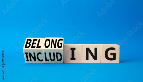 Belonging and Including symbol. Turned cubes with words Belonging and Including. Beautiful blue background. Business, psychological and Belonging and Including concept. Copy space