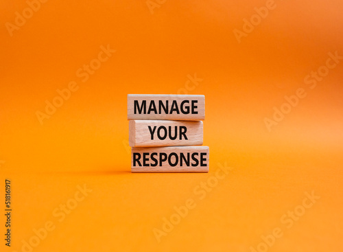 Manage your response symbol. Concept words Manage your response on wooden blocks. Beautiful orange background. Business and Manage your response concept. Copy space