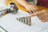 Woman with coin stack. Financial Growing savings concept. Saving money by hand putting coins money accounting planning