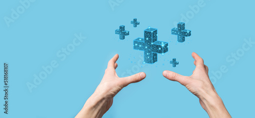 Businessman hand holding 3D plus low polygonal icon.Plus sign virtual means to offer positive thing like benefits, personal development, social network Profit,health insurance, growth concepts.