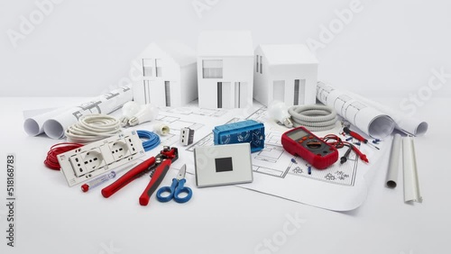 electrical controls for house planning, equipment and electrician work tools on blueprint with model house, electric store, technical assistance, supply and installation, electrical systems concept