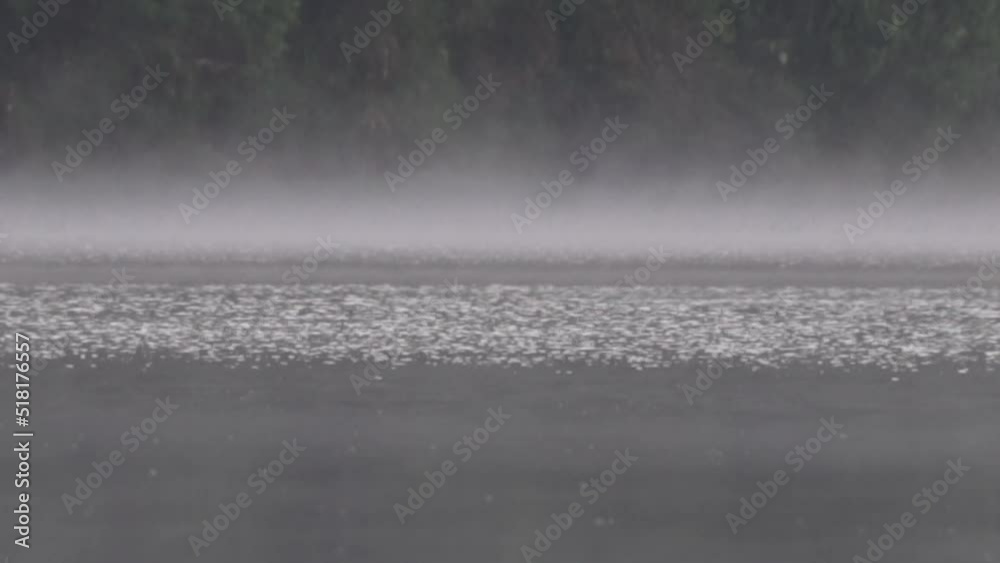 Peaceful Morning at Situ Patengan Patenggang Lake in Ciwidey Bandung West Java Indonesia - Steam Fog Above The Water Peaceful Morning at Situ Patengan Patenggang Lake in Ciwidey Bandung West Java Indonesia - Steam Fog Above The Water