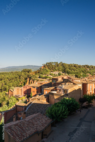 Street view of the small town of Roussillon, the red clay city in Provence, South France photo