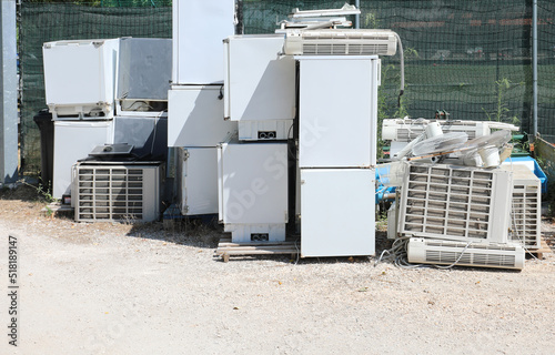 recycler landfill for the separate collection of bulky broken appliances used with old white refrigerators and air conditioning systems photo