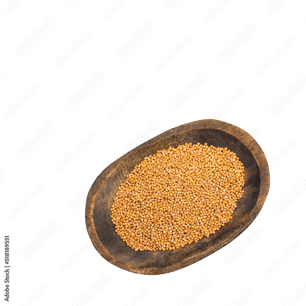 Sinapis alba - Organic yellow mustard seeds in the wooden bowl Sinapis alba - Organic yellow mustard seeds in the wooden bowl