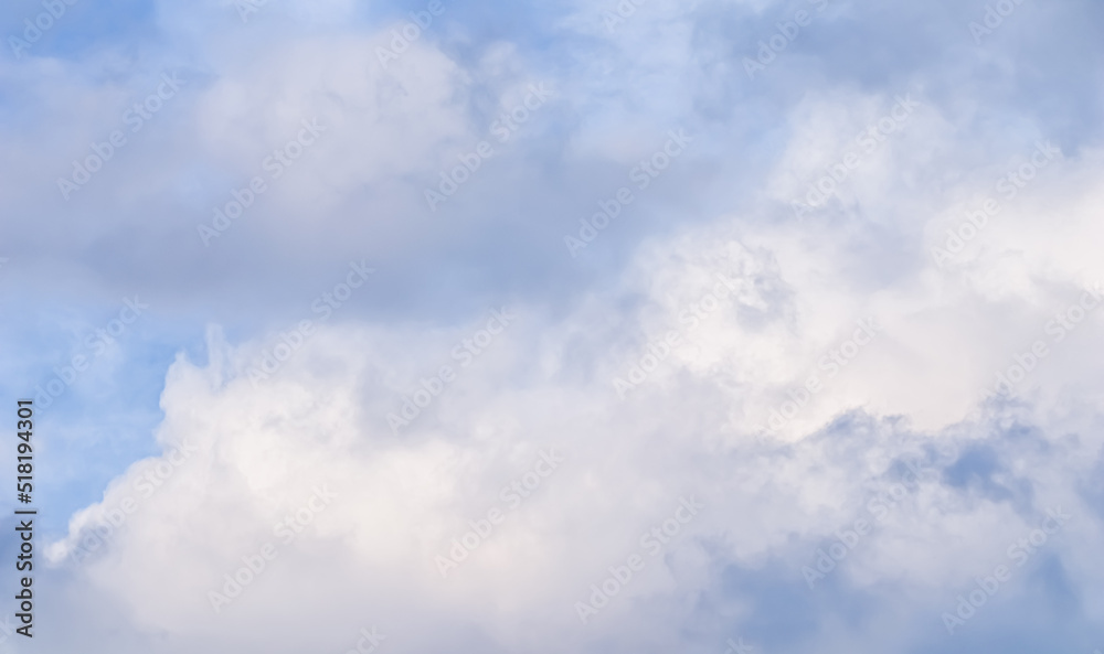 Cloudy sky background with pale pink clouds at sunset Cloudy sky background with pale pink clouds at sunset