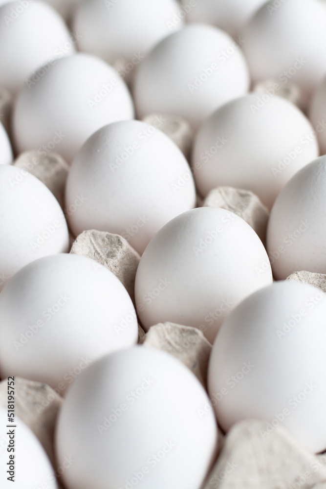 White eggs on a white background. Easter photo concept. Close up. View from above. White eggs on a white background. Easter photo concept. Close up. View from above.