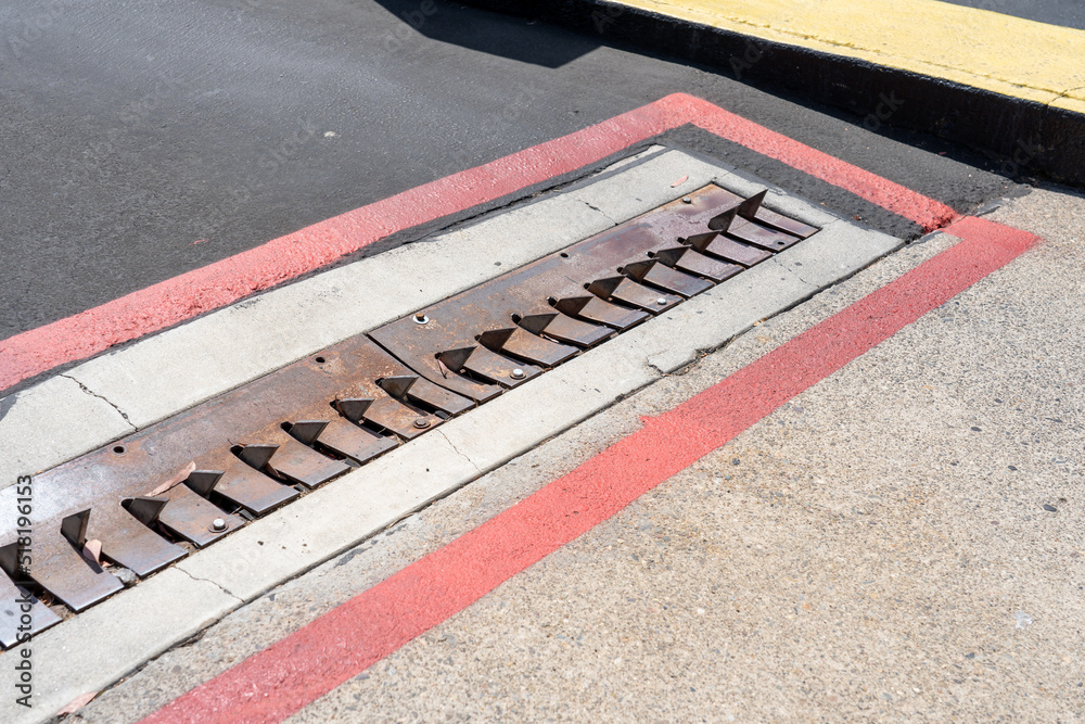 InGround Traffic Spikes are shown in a parking lot. Traffic Spikes are