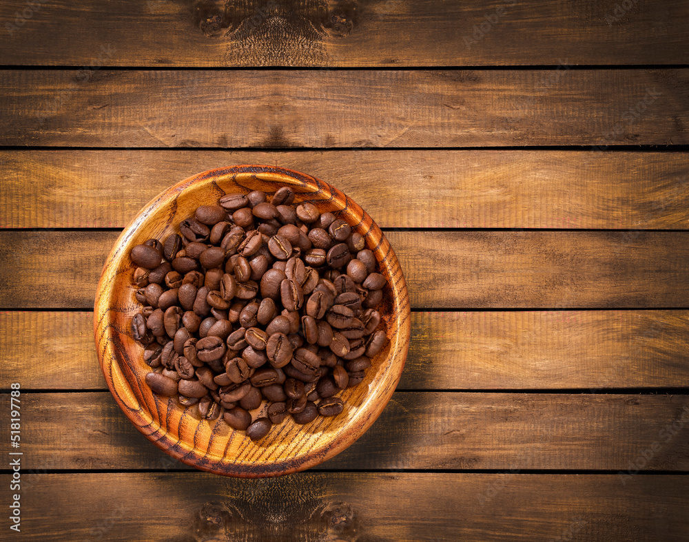 Coffea - Brown roasted coffee beans in the bowl