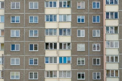 Beautiful modern multi-storey building in a new area of the city. View of the windows of an apartment panel house. An ordinary apartment building in a Russian city.