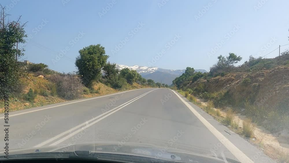 POV of driving on a road in Crete, Greece in UHD resolution POV of driving on a road in Crete, Greece in UHD resolution