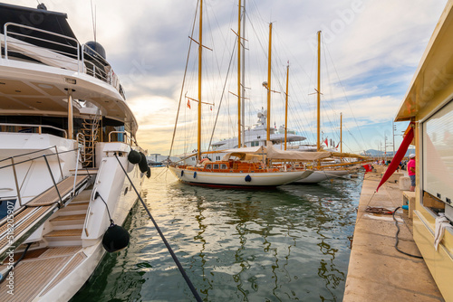 Sailboats and luxury yachts in the old port marina at the Mediterranean city of Saint-Tropez on the French Riviera.