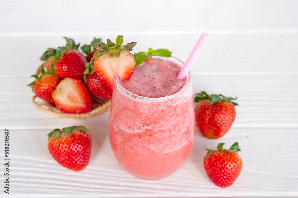 Strawberry yogurt fruit juice smoothie pink colorful fruit juice milkshake blend beverage healthy high protein the taste yummy In glass drink episode morning on white wood background. Strawberry yogurt fruit juice smoothie pink colorful fruit juice milkshake blend beverage healthy high protein the taste yummy In glass drink episode morning on white wood background.