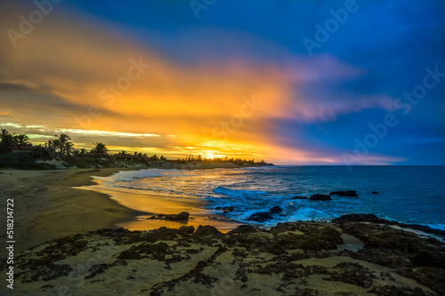 Beautiful sunset under the beach horizon. The blue enhancing nature