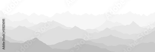 Black and white mountain landscape, ridges in the fog, panoramic view