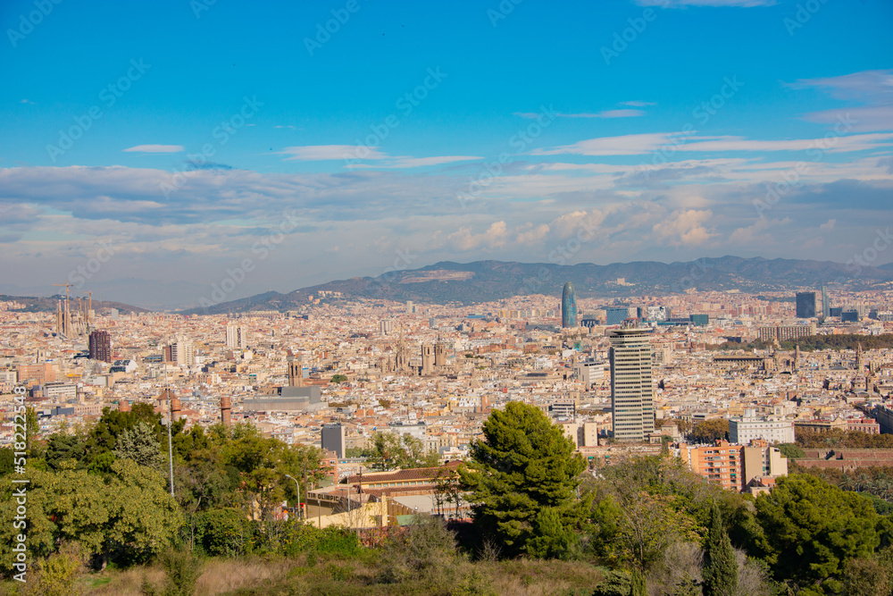panorama of the city of barcelona with sagrada familia and buildings
