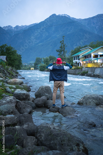 Man on the bank of lake, Sorry to nature, Lidder River, Pahalgam, Jammu and Kashmir, India.