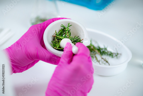 Aromacology. Female Aromacology Expert Preparing Ingredients for Fragrances. photo