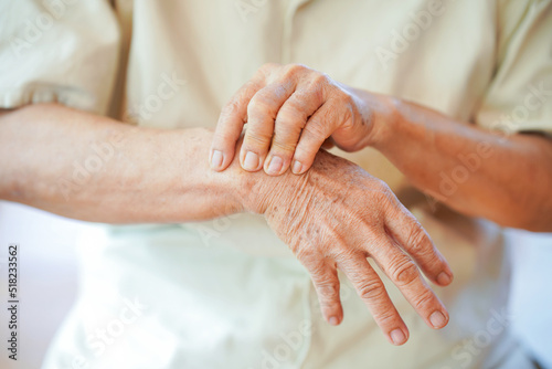 Wrist pain in the elderly or diseases related to rheumatism. Concept of health problems in the elderly. photo