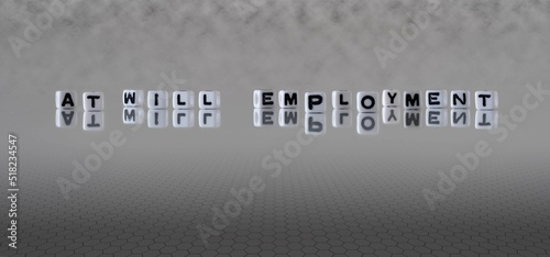 at will employment word or concept represented by black and white letter cubes on a grey horizon background stretching to infinity