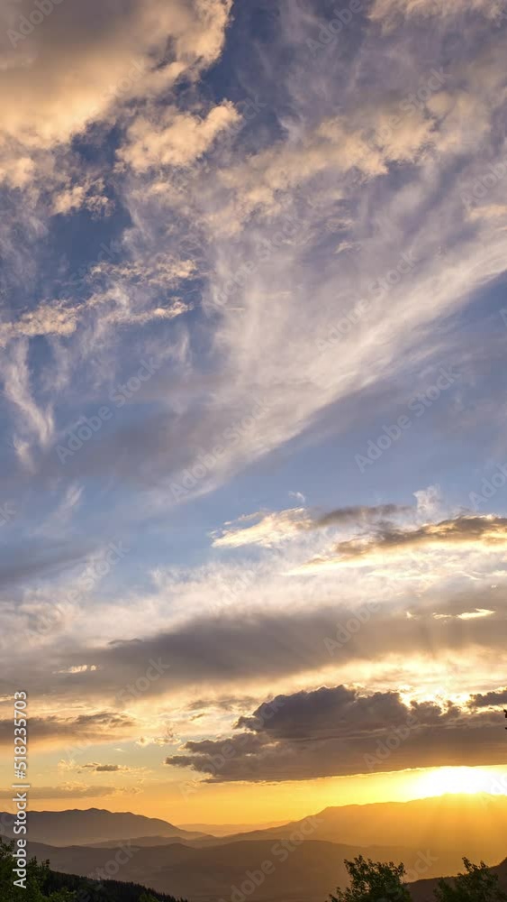 Time lapse during sunset from Skyline Drive in Utah as sun lights up clouds on the horizon. Time lapse during sunset from Skyline Drive in Utah as sun lights up clouds on the horizon.
