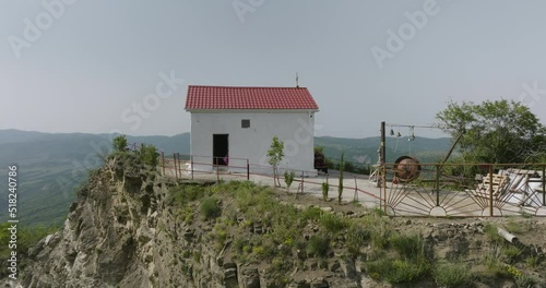 Modest sanctuary located on a hilltop above the rural Tsveri town, Georgia. photo