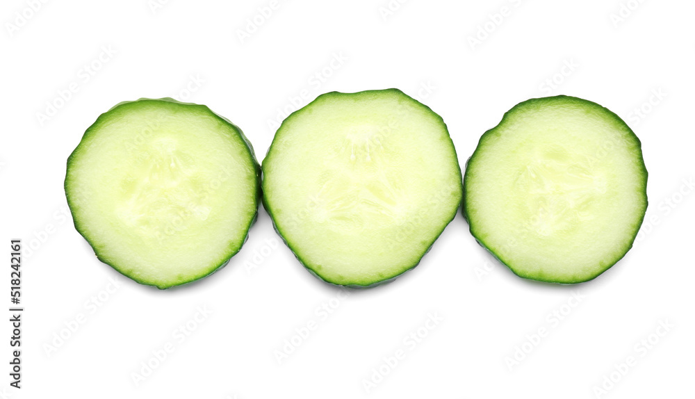 Slices of fresh ripe cucumber isolated on white Slices of fresh ripe cucumber isolated on white
