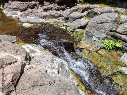 Small  waterfall in the Black Gorge on the banks of the Zavitan stream in the Golan Heights, near to Qatsrin, northern Israel photo