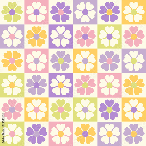 Vintage stylised flowers, placement by grid. Cheerful floral surface design print in old school 60s, 70sColorful retro background. Geometric abstract seamless pattern .
