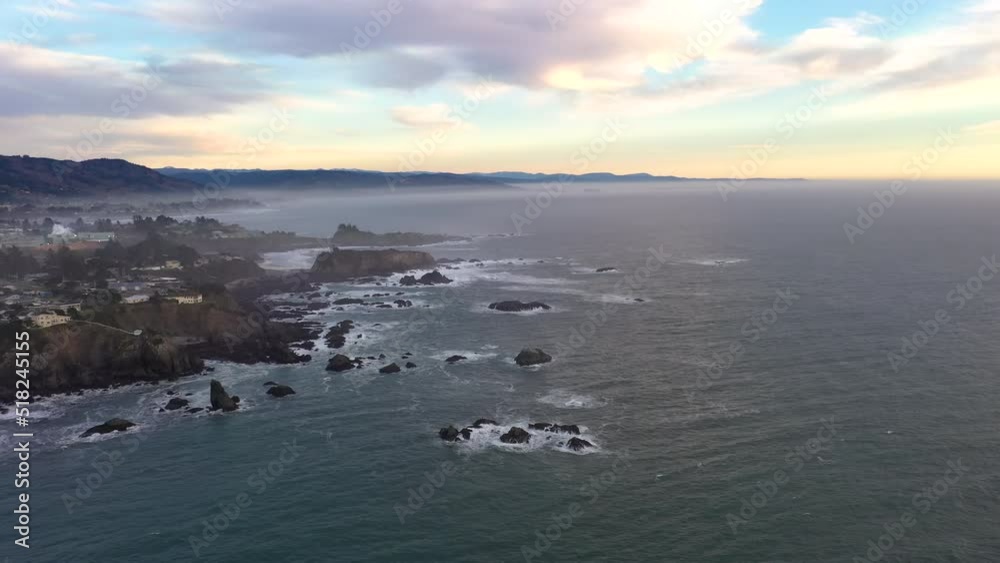 Panoramic aerial view of Brookings, Oregon coastline at sunset. Panoramic aerial view of Brookings, Oregon coastline at sunset.