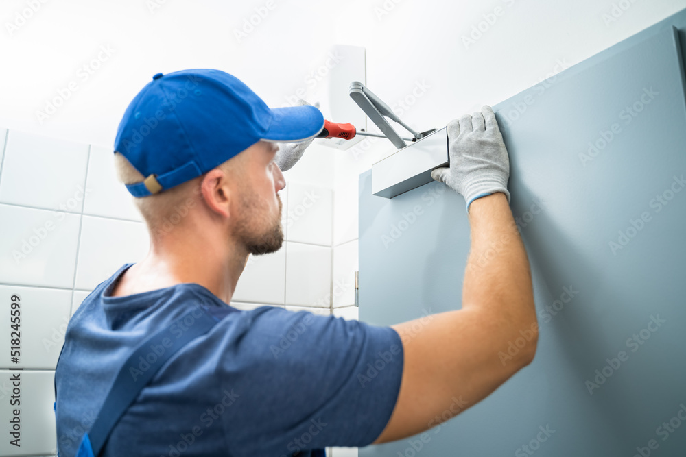 Handyman Installing And Fixing Automatic Door Closer Handyman Installing And Fixing Automatic Door Closer