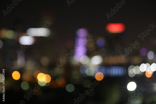 Blurred lights at twilights, city and office building, abstract background © AJITH.A