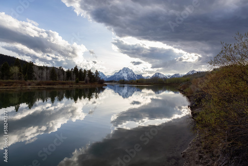 River surrounded by Trees and Mountains in American Landscape. Snake River  Oxbow Bend. Spring Season. Grand Teton National Park. Wyoming  United States. Nature Background.