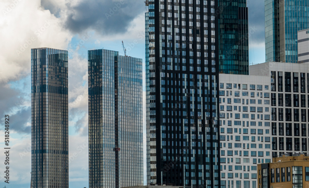 urban landscape with high-rise buildings and a panoramic view of the city on a summer day taken from a drone urban landscape with high-rise buildings and a panoramic view of the city on a summer day taken from a drone
