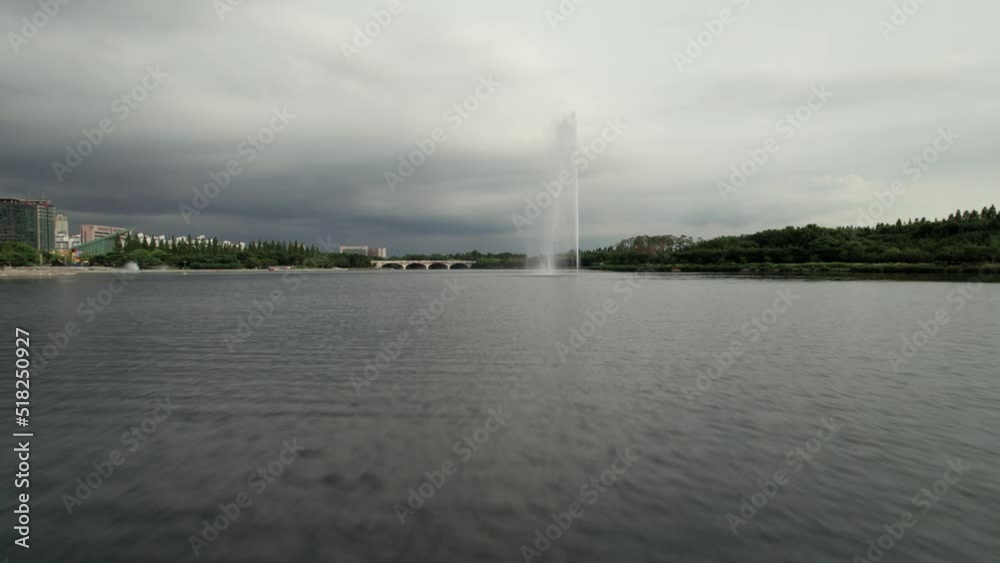 Aerial Drone of Artificial Lake in Korea Seoul Ilsan with Giant Water Feature and dramatic sky Aerial Drone of Artificial Lake in Korea Seoul Ilsan with Giant Water Feature and dramatic sky