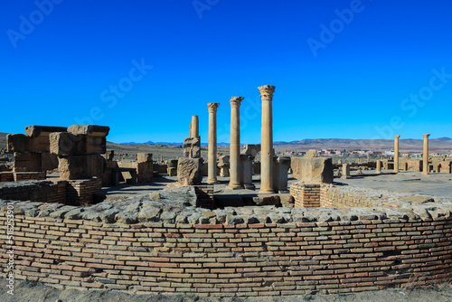 View to the Ruins of an Ancient Roman city Timgad also known as Marciana Traiana Thamugadi in the Aures Mountains, Algeria photo