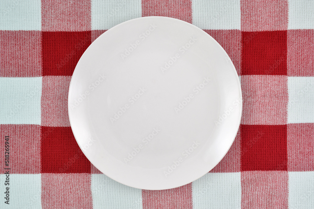 Plate on Red and White Checkered Tablecloth Plate on Red and White Checkered Tablecloth