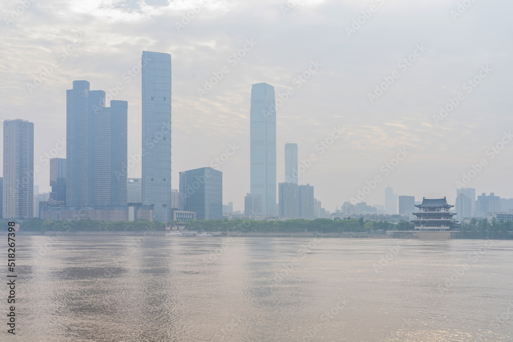 Fototapeta premium The skyline of urban buildings and the scenery of the Yangtze River in Changsha, Hunan Province, China