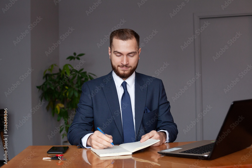 Happy businessman planning in office Happy businessman planning in office