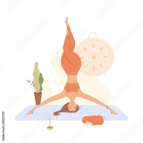 A woman practices yoga headstand balance at home next to a sleeping cat. Vector cartoon illustration of girl and mandala, trendy flat style.