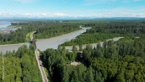 4K Drone Video of Alaska Railroad Train Trestle with Mt. Denali in Distance during Summer photo