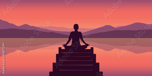 meditation silhouette at beautiful lake and mountain autumn landscape