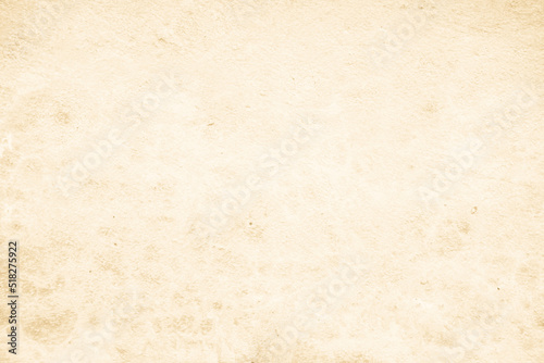 Old concrete wall texture background. Close up retro plain beige color cement material surface rough element concept.
